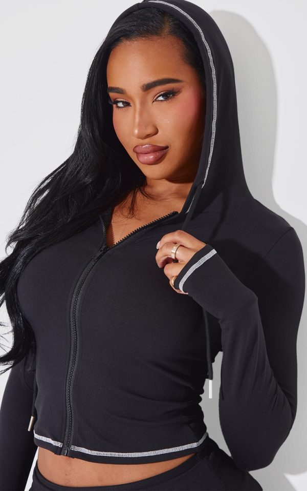 000e2eda44599c4506236e1b98b8595c52cfc6a0_CNJ9551_4_shape_black_sculpted_contrast_stitch_zip_through_hoodie-1