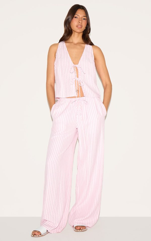 007c7b8fd8fdf5329b9a109a801d1b062756e4d0_CNM9132_3_pink_striped_sleeveless_tie_front_top