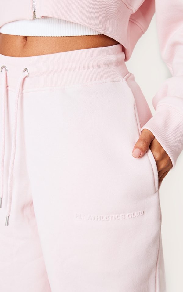 009d8e0a07f71f4ca35bbf8cff0b2221497e6caf_CNL2347_4_petite_baby_pink_tie_waist_embossed_detail_wide_leg_joggers