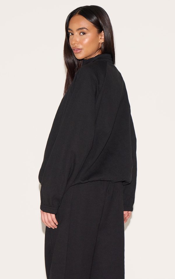 011f219e500f6e21b5d2d8103faf0947bba9ed41_CNM7248_2_petite_black_oversized_interlock_zip_through_sweatshirt