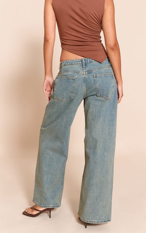0169d5e7f4e68e4194153c65422a19cbc638ee98_CNM0946_3_vintage_bleach_wash_low_rise_wide_leg_jeans