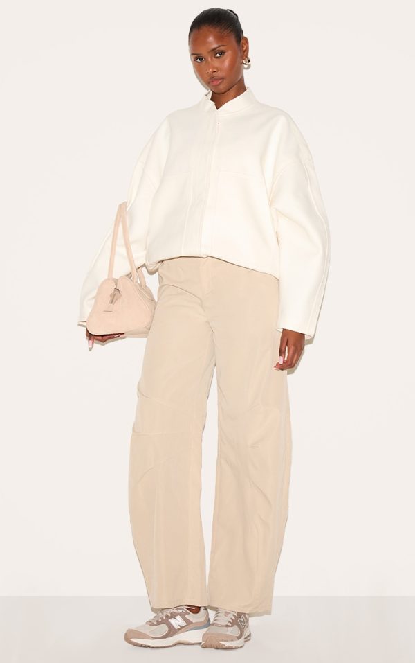 01d47591e3a0eef2a7668fd45d10a4b84a4d2cfa_CNM0636_1_stone_woven_tailored_cocoon_leg_trousers