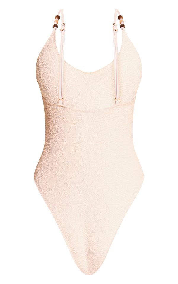 0222ac7c6b8e2f2a65e589d5d912b3102e567496_CNM6701_6_white_textured_bead_trim_plunge_swimsuit