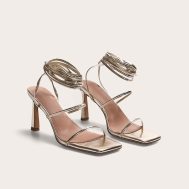 028016e7e0386b62257dd74b6b37049dd7ec5773_CNL7030_2_gold_pu_square_toe_strappy_lace_up_mid_stiletto_heeled_sandals