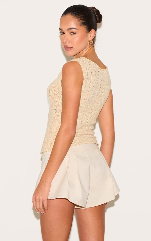 02ea1dc76a2e2f9972004b69617c9c6f7912d6db_CNL8186_2_oatmeal_textured_filigree_knit_boat_neck_asymetric_hem_vest_top
