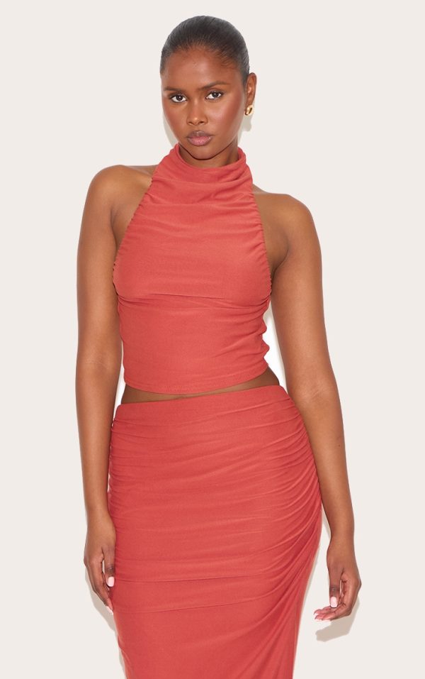 039fdef397247fbc67f4f0376f5c4ffbff6764bc_CNN0617_1_rust_soft_touch_ruched_halter_crop_top