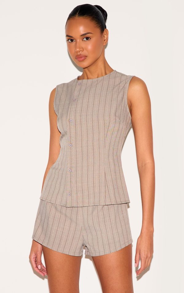 03ea9fa87c693d83259e3547cd3a8338a61b818c_CNL9231_1_brown_pinstripe_linen_asymmetric_button_down_playsuit