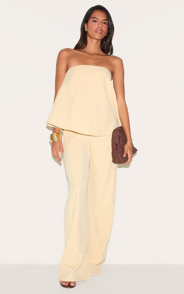 049d6994d312a7d726a4e0246342a994462b2455_CNM7297_3_butter_yellow_structured_woven_peplum_straight_leg_jumpsuit