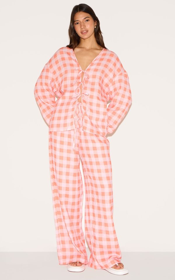 04c8df6db5d13734bccbee2f73d8f76f141d0681_CNM1760_1_orange_checked_cheesecloth_tie_waist_wide_leg_trouser