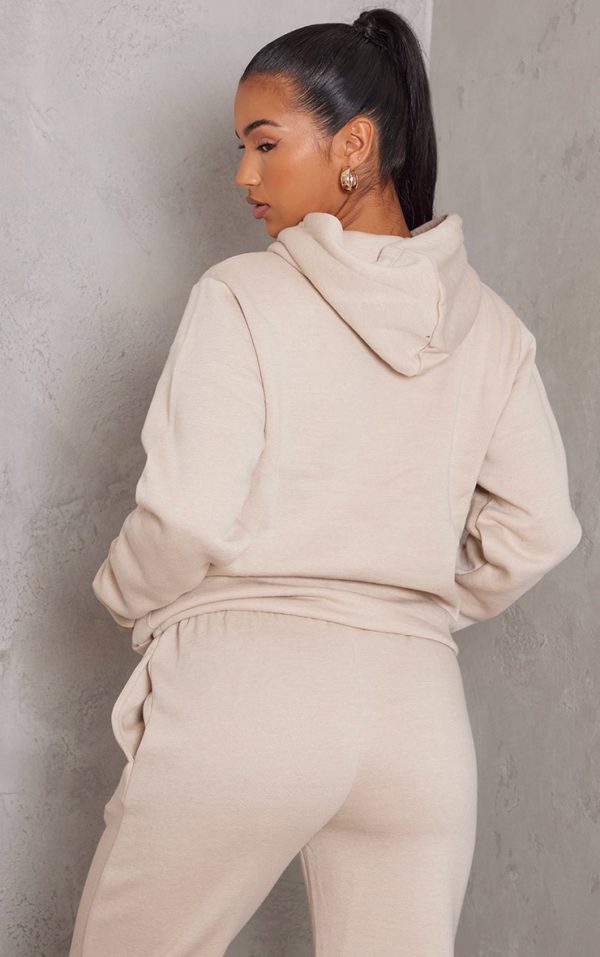 0512e479cb897a3c54e4c9d794937af55f43de81_CNE5698_2_prettylittlething_sand_logo_badge_detail_oversized_hoodie