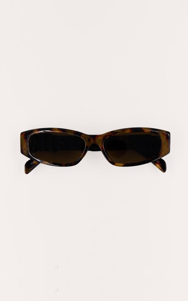 0597ff2082360e627045bc7ae616c9d1b7ae7691_CNL7849_2_brown_tort_slim_cat_eye_sunglasses