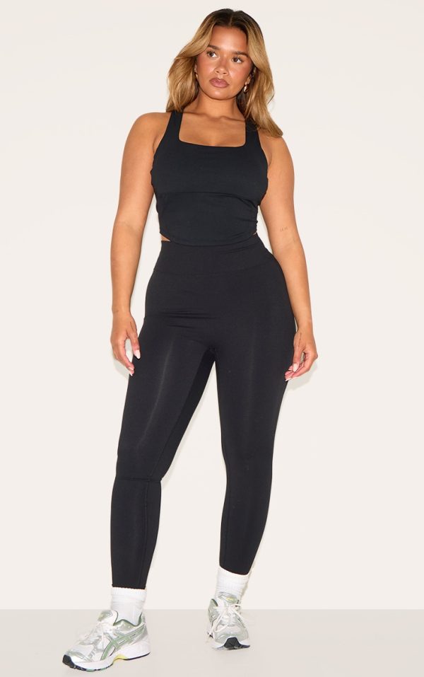 06d81b10c638deab8cc88be85e206402cb1723c1_CNM6292_3_shape_black_active_cupped_seam_detail_sports_bra