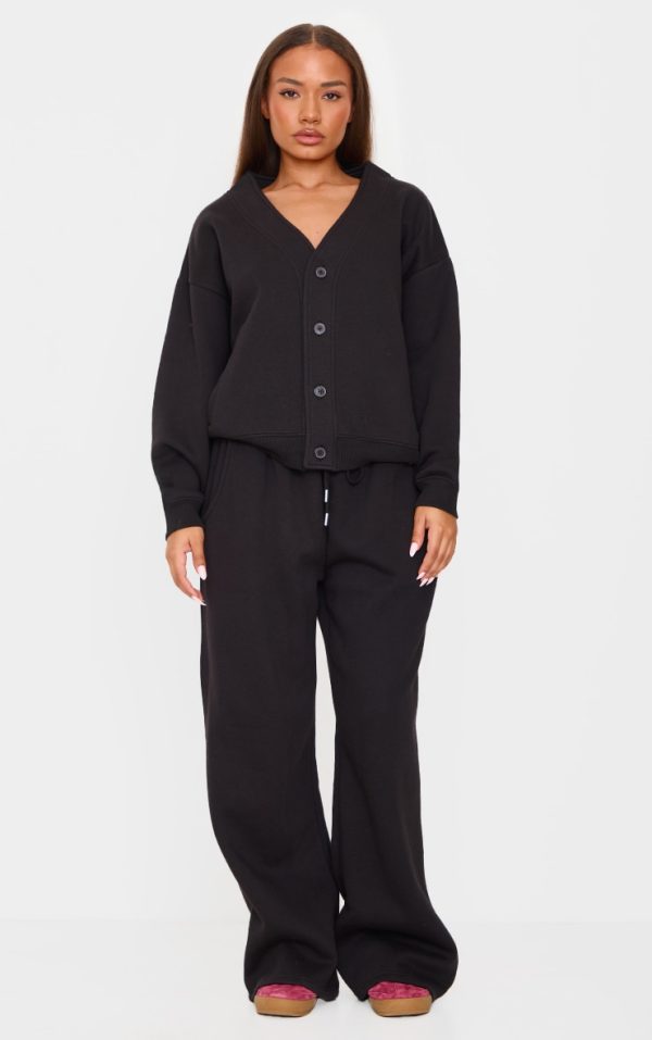 06e540bed11f4b2dd8594bc334c24381e480dbde_CNL1404_3_petite_black_button_up_side_pocket_sweatshirt