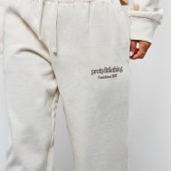 06e7f71e18e7baff5c27e4c31f0c6788cb68a86f_CNK1316_4_prettylittlething_petite_cream_premium_print_wide_leg_joggers