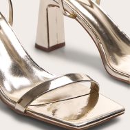 06f9e056acc7dc20f0f48170fe6ef2fcfa09e312_CNM0241_4_gold_pu_pu_square_toe_barely_there_block_high_heel_sandals
