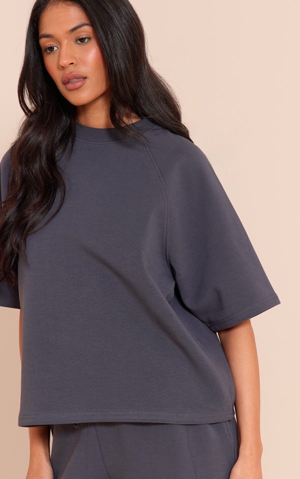 07d358bd7cb4f34bac38ed355812f6c97e25e934_CNM9876_4_tall_navy_interlock_cropped_boxy_sweatshirt