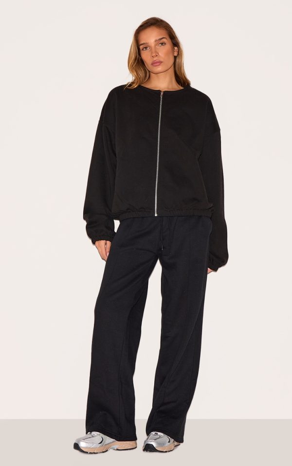 083192bcbc47a9511039579e1aa001d16e411bd2_CNL9623_3_black_premium_oversized_boxy_collarless_zip_sweat_top-1