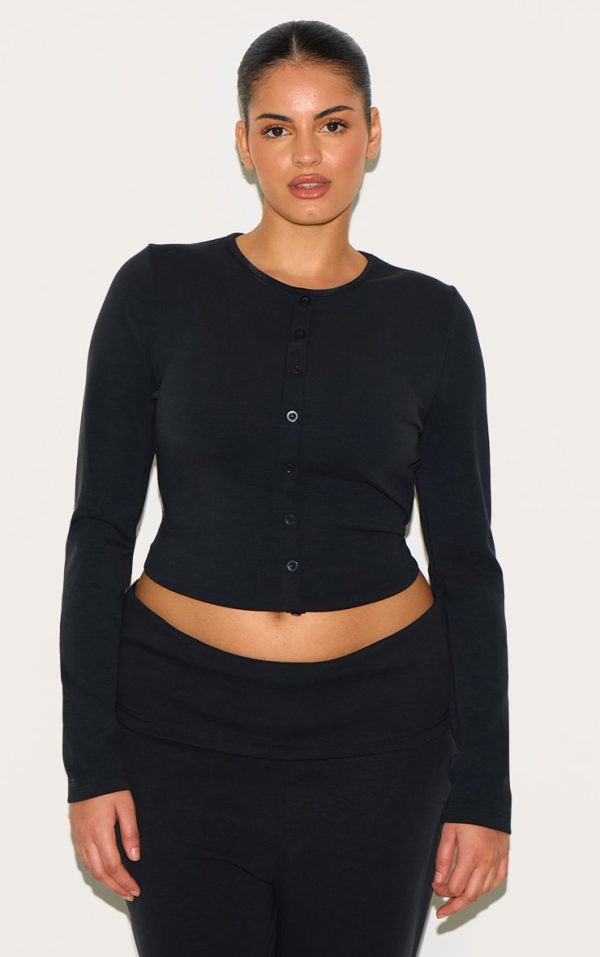 08e75b43e56582f6b5743c442a19d2946611e8e2_CNM4453_1_plus_black_modal_button_detail_long_sleeve_top-1