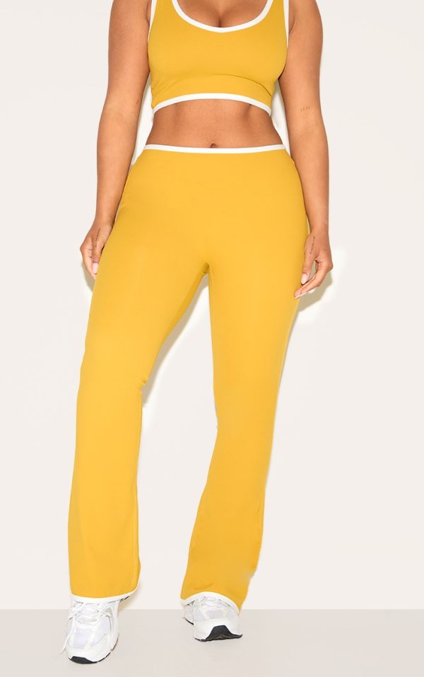 0977155cff4b4da116e6ce79f3b08bc625f7097f_CNM6437_2_shape_olive_sculpt_active_contrast_binding_flare_trousers