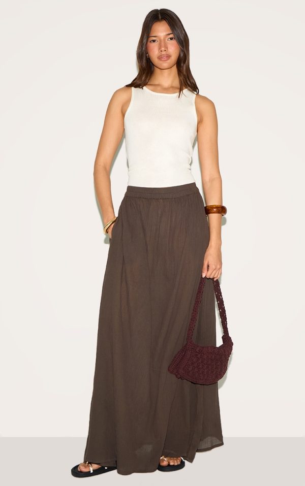 09bbde08f3403ba49d9b1c9d6fd23b649af4dfd1_CNM3530_2_dark_chocolate_linen_blend_seam_detail_mini_skirt-1
