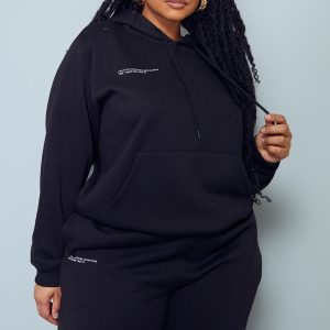 PRETTYLITTLETHING Plus Black Est 2012 Printed Oversized Hoodie