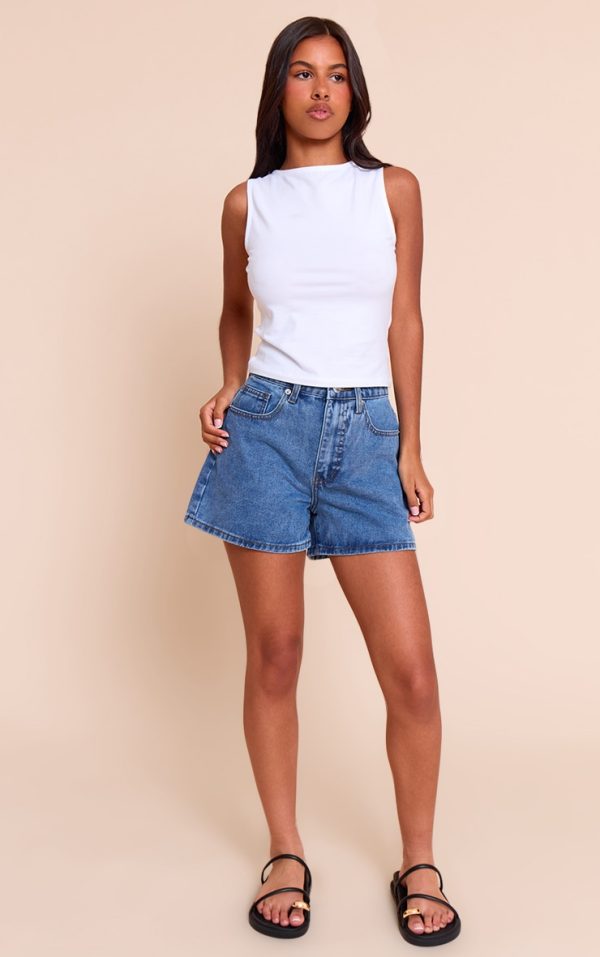 0a09583fe8c5362880a98be88ce88df47c7afb03_CNM3436_4_petite_mid_blue_wash_high_waisted_mom_shorts