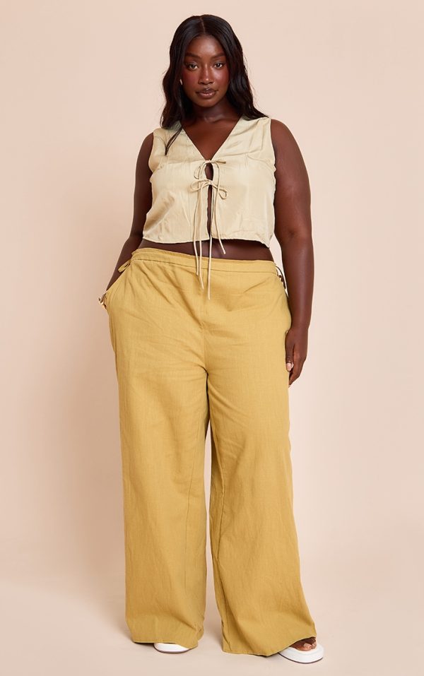0a99951de46559f9e84236ee9c2a1ea5201ada03_CNM7908_1_plus_olive_premium_linen_side_tie_detail_wide_leg_trousers