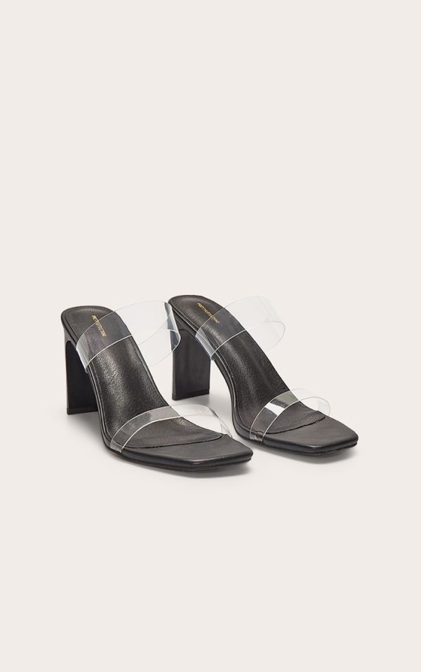 0b1a21e27b472f50486600839a7c3bcd381eff37_CNL6439_2_black_pu_square_toe_perspex_straps_high_thin_block_heeled_mules