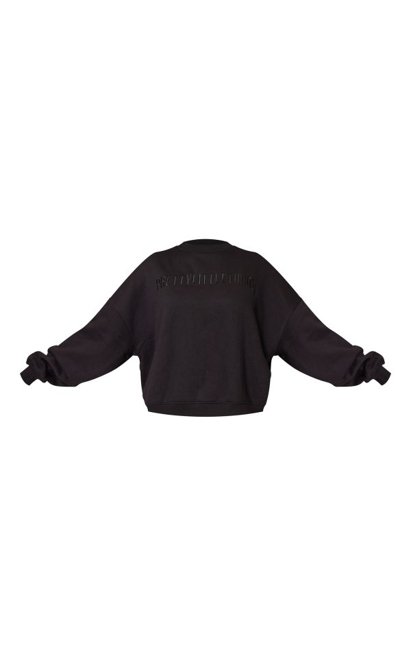 0b328cd045d1be6822833a9a94ecf0a3a0d02fe0_CNK6319_5_prettylittlething_black_boxy_embroidered_sweatshirt