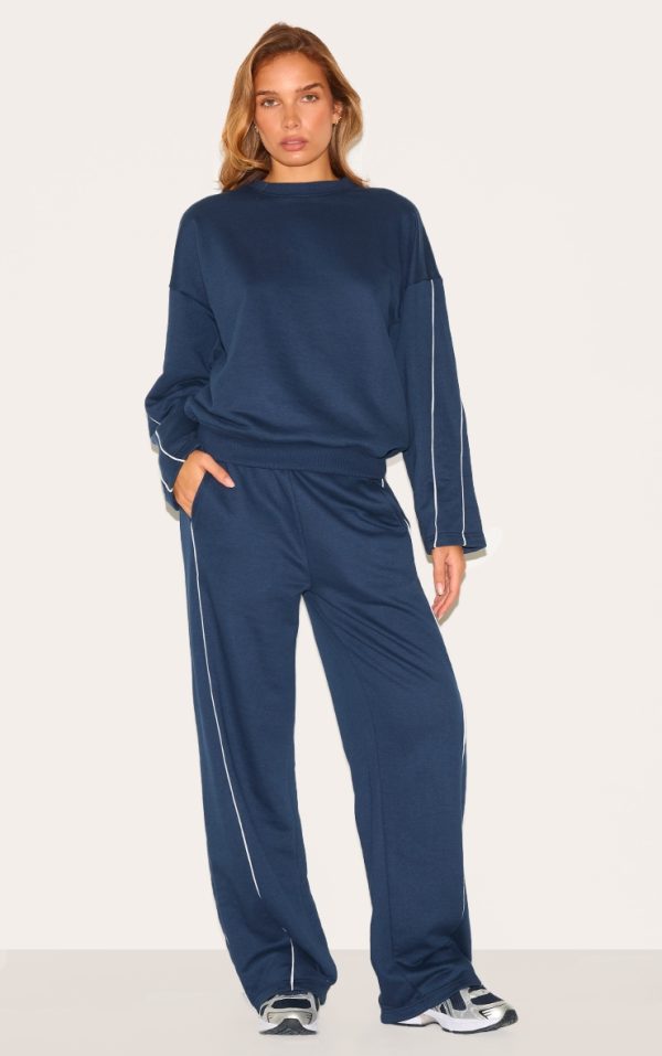 0bcbb77c43f97aff308c2e9cf83b248af1dec682_CNL8279_1_navy_contrast_piping_detail_wide_leg_joggers-1