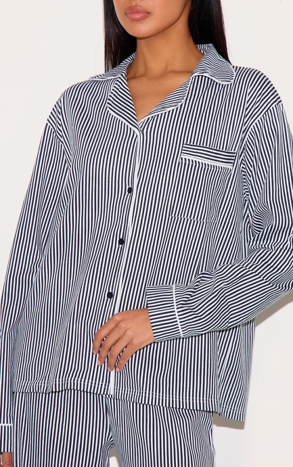 0c68e0c89b8fb8584ea7413e76b8abc34ea70bf4_CNL9753_4_navy_stripe_print_jersey_piping_detail_long_pj_set