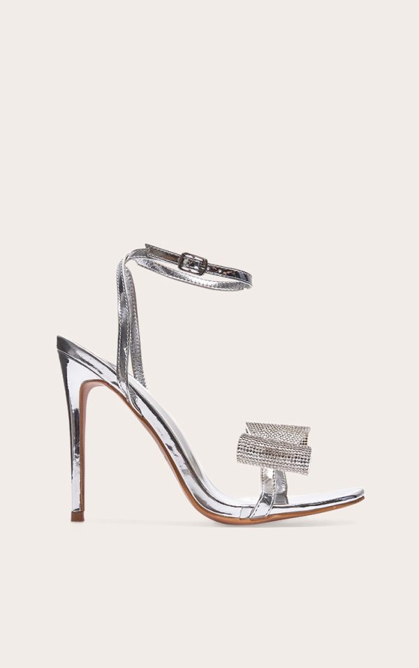 0cb38101f90e4b5ce023656449bc0db21c7bfcc8_CNK1674_1_silver_pu_round_toe_diamante_bow_heeled_sandals