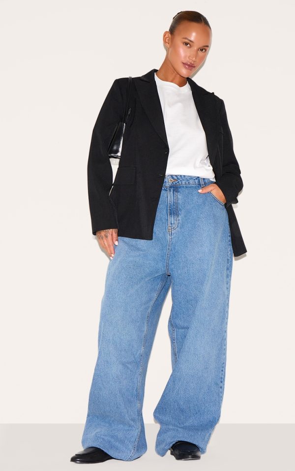 0cf3f691d4906e2be3974e80b2cda4a66d64d764_CNG5458_1_prettylittlething_plus_mid_blue_wash_high_rise_boyfriend_jeans