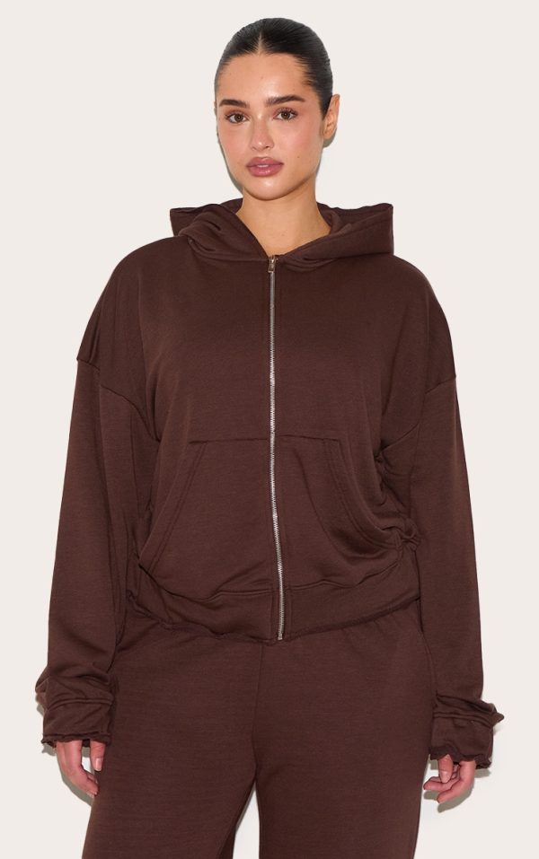 0d0a40666fb8ae2e6bca8a17feccff3d133d0a4d_CNM1975_1_shape_chocolate_zip_through_hoodie