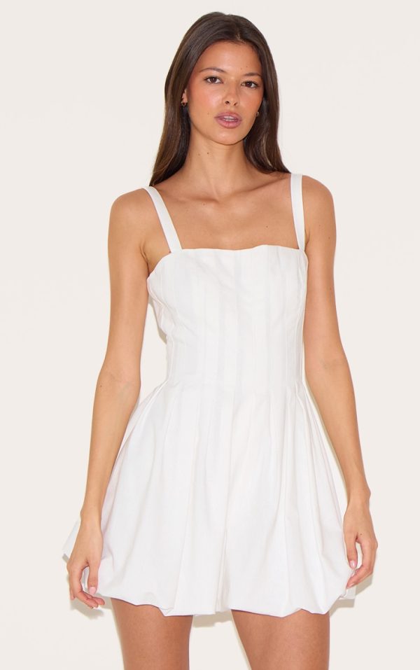0d97edc41fb16c73e93d662f57ffea11a20e5b38_CNL9243_1_white_twill_pleated_puffball_playsuit