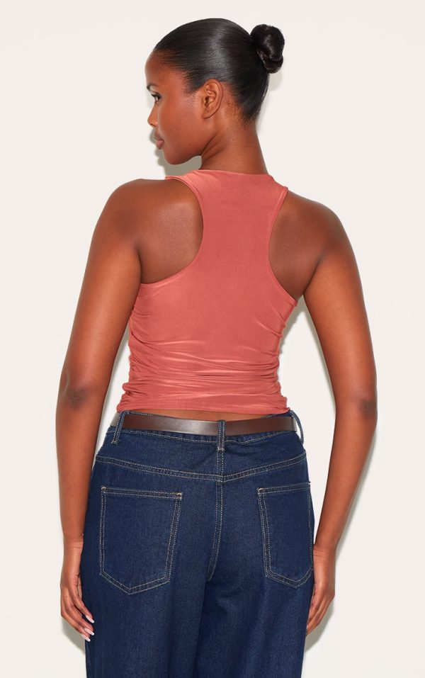 0dd14a94b7e9204b9bb5ac097b3c4a5a605d3bfe_CNM6681_2_paprika_soft_touch_asymmetric_hem_racer_vest-1