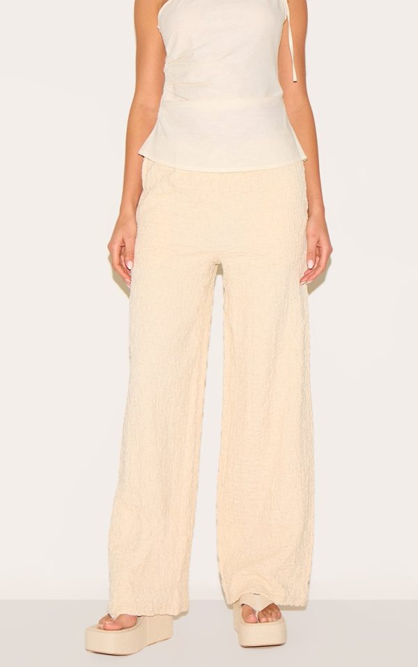 0df681ba6c1a781b2fd7a0bace25a6ac1f11f1ac_CNM7951_2_cream_textured_jersey_drawstring_waist_wide_leg_trousers