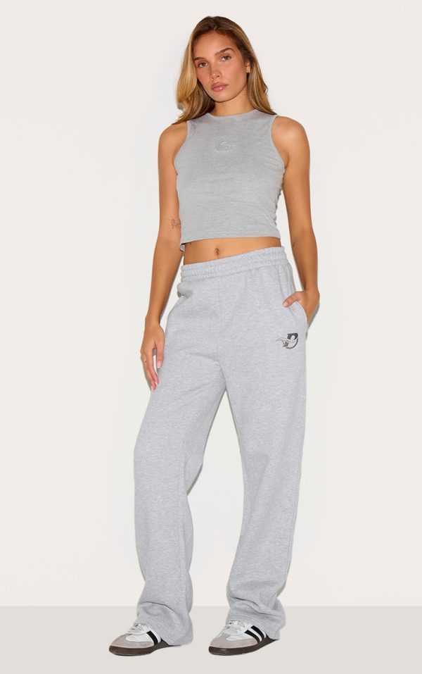 0e1ee1872a98d941a94d05bfa771bdd70abaae82_CNF8465_1_prettylittlething_ash_grey_logo_embroidered_wide_leg_joggers
