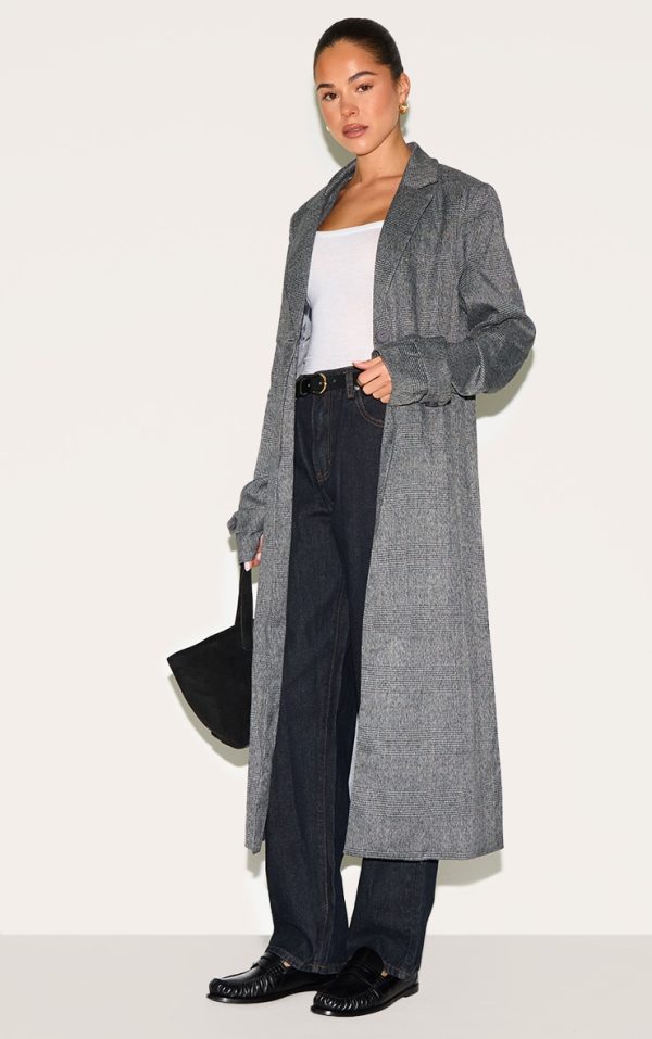 0e360a6d12c4f12b7238b8c6b17a9a725d109e36_CNL6394_3_grey_check_print_oversized_trench_coat-1
