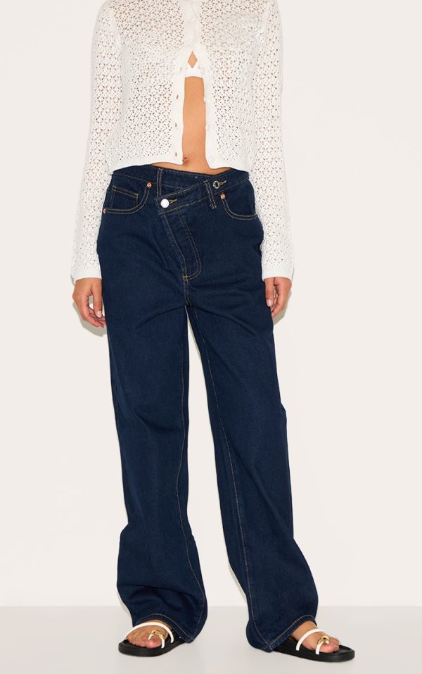 0e5b50b6c7b7c44beb869ba98166397ac543ac6f_CNM1833_1_petite_indigo_denim_asymmetric_waistband_straight_leg_jeans
