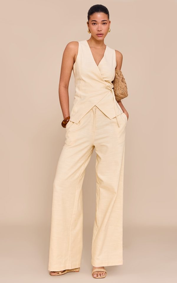 0e5ba8d3e7baa4a9b6868cbd81feece9a5e3033e_CNM6319_3_almond_textured_asymmetric_tie_front_waistcoat