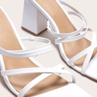 0e647f3db20e8db2c77897b985d24b0155014484_CNJ1541_4_white_pu_wide_fit_square_toe_strappy_block_heeled_mules