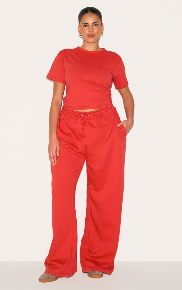 0ec77a6cb469999d19c21fbb804574f8cdecf9dd_CNM0770_1_prettylittlething_plus_red_printed_wide_leg_joggers