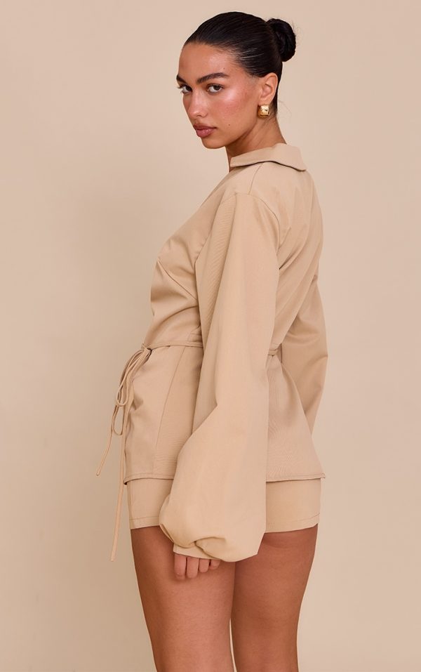 0ede81b30ebb72b8fd7b4ce2b88ca0821a5c15dc_CNM8786_2_sand_woven_tie_front_gold_hardware_detail_shirt