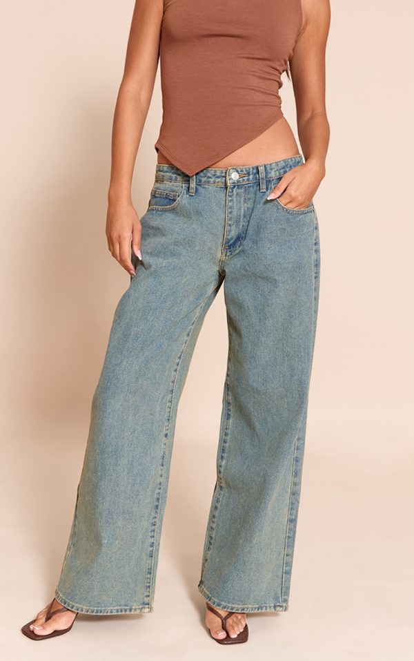 0eefa09d757a9a5f6f3c9f4134445599b1399003_CNM0946_1_vintage_bleach_wash_low_rise_wide_leg_jeans