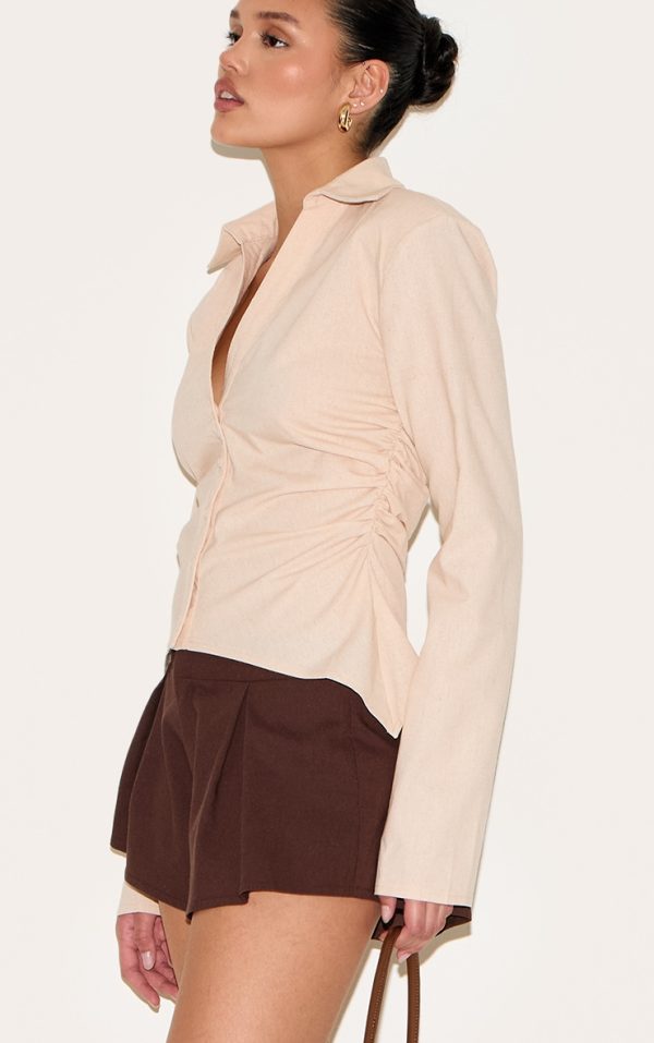 0f1f00a24696a7631eb580ebc370bf1b82016a9d_CNM3782_4_beige_linen_blend_shoulder_padded_fitted_shirt-1