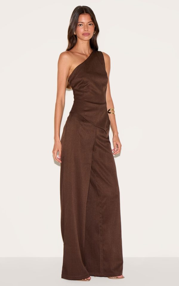 0f8234d00a5b8fec5fa7b6f6b945f3c1fe915d0a_CNN0139_3_chocolate_woven_one_shoulder_wide_leg_jumpsuit