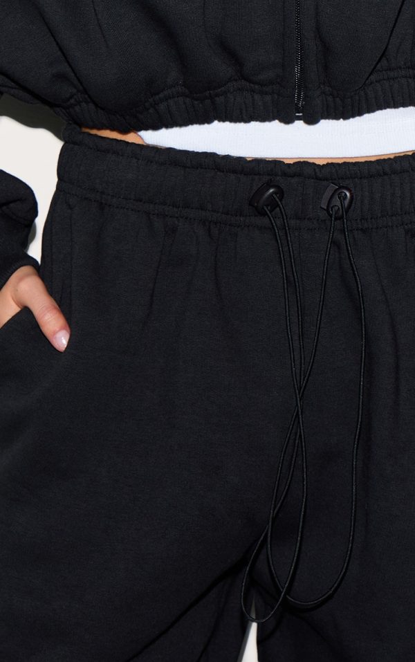 0fb941f04325ea58cb400255d528966afa015289_CNM7119_4_black_drawcord_hem_oversized_joggers