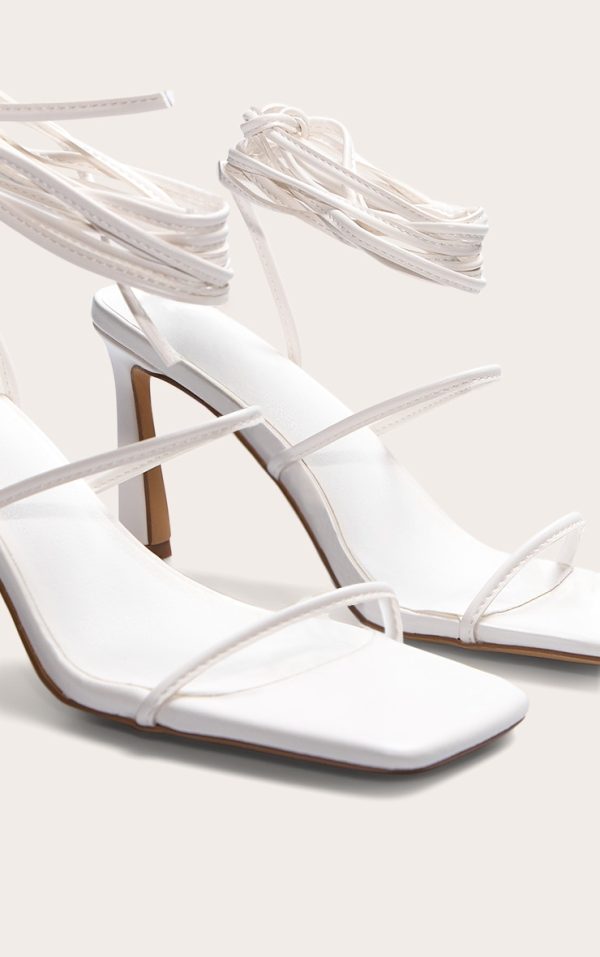 11adbd044e348da0af00c495d0de5584638cb8af_CNL7027_4_white_pu_square_toe_strappy_lace_up_mid_stiletto_heeled_sandals