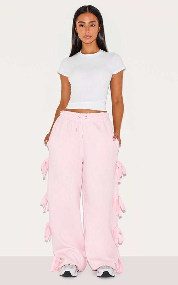 11d6db22d5e4e8a8675137f0faf78a341ee6f0b3_CNK0422_1_petite_baby_pink_wide_leg_joggers_with_bow_details